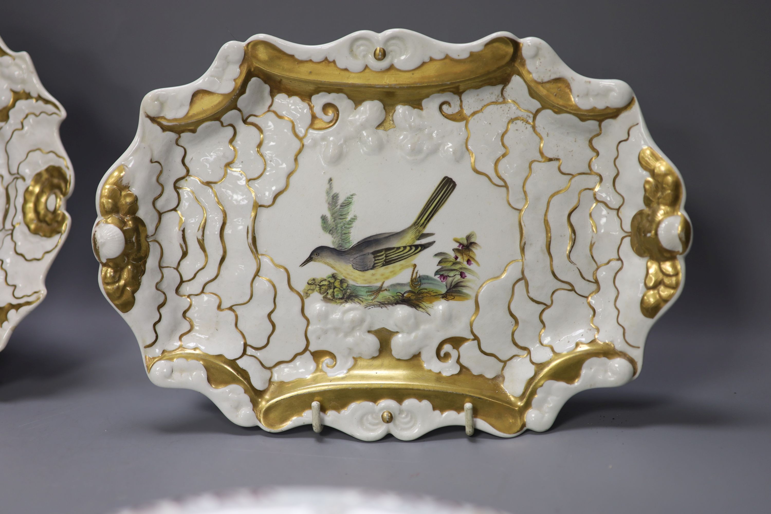 Four French faience plates and three Mason’s Cambrian Argil dishes and to early 19th century English porcelain ornithological dishes